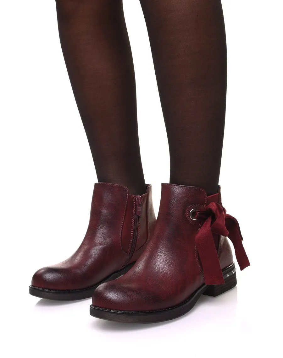 Bottines bordeaux à noeud et oeillets