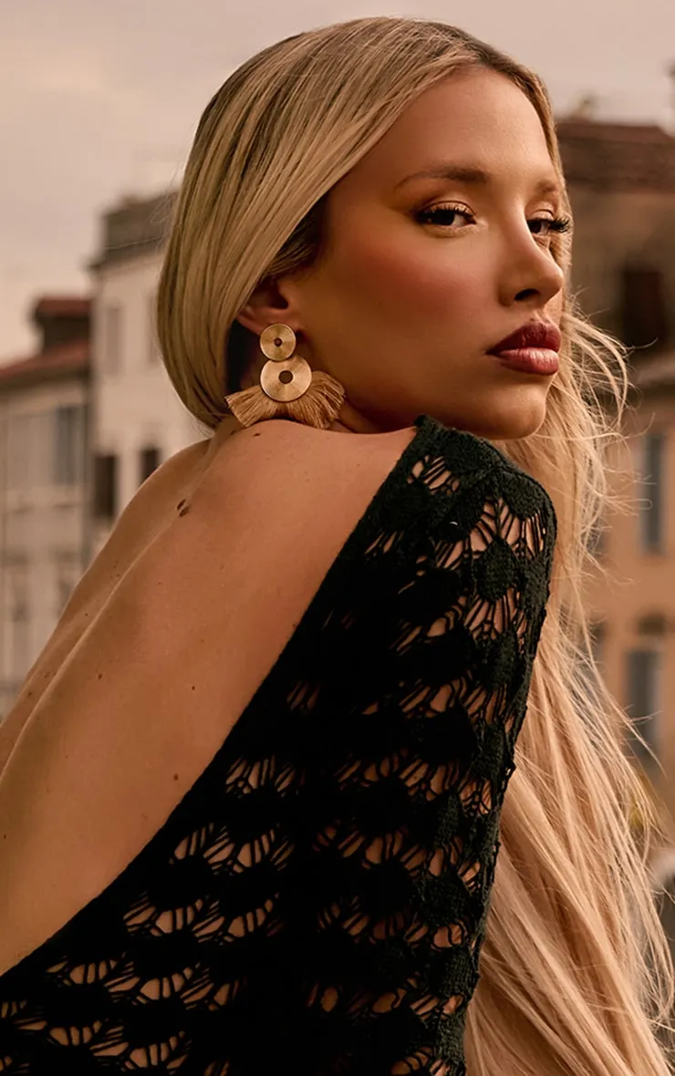 Boucles d'oreilles dorées XXL en disques et à détail franges