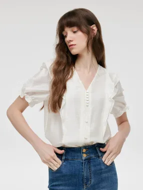 Chemisier femme à manches bouffantes et col en V