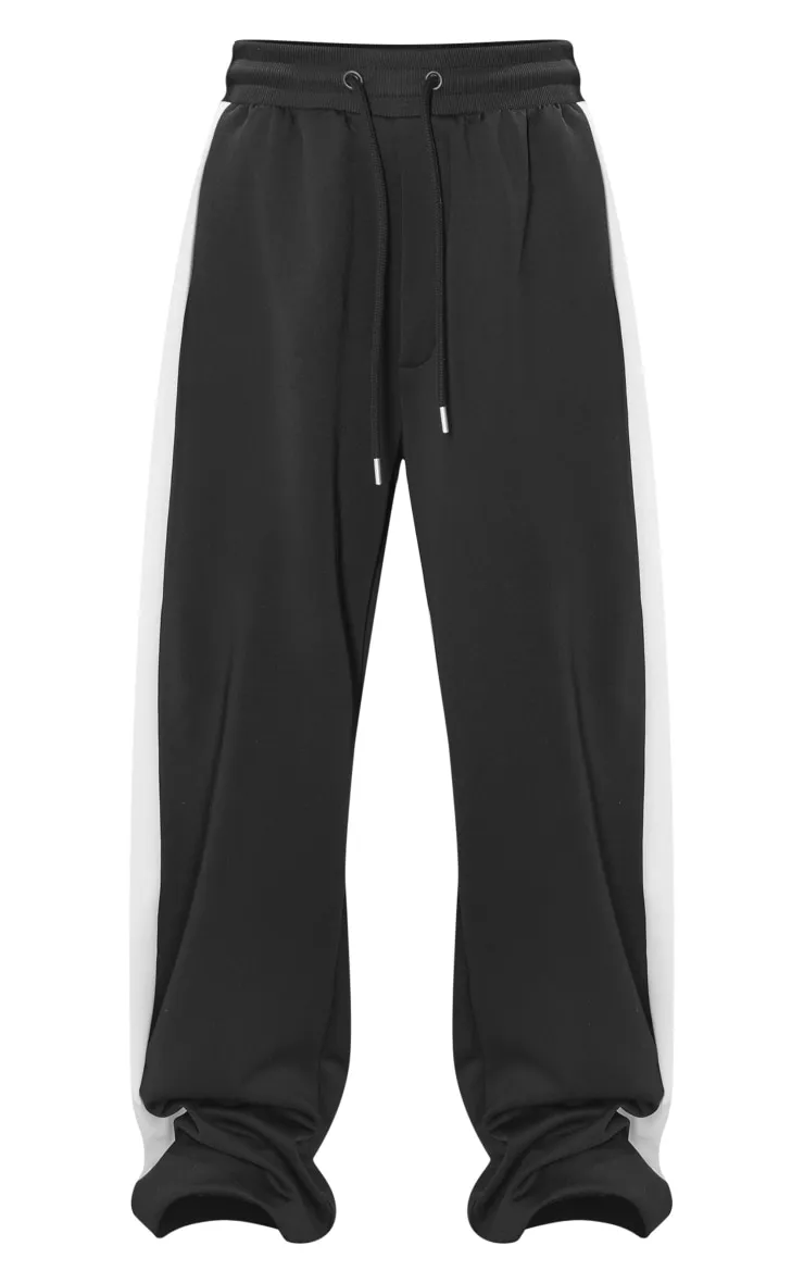 Pantalon de jogging large noir à bandes latérales en maille tricot