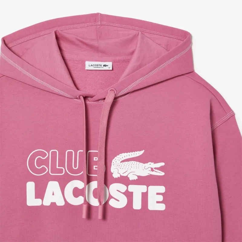 SWEATSHIRT À CAPUCHE FEMME LACOSTE OVERSIZE FIT ROSE AVEC MARQUAGE CONTRASTÉ