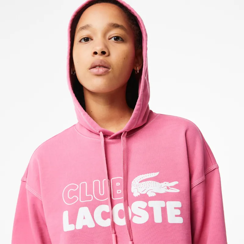 SWEATSHIRT À CAPUCHE FEMME LACOSTE OVERSIZE FIT ROSE AVEC MARQUAGE CONTRASTÉ