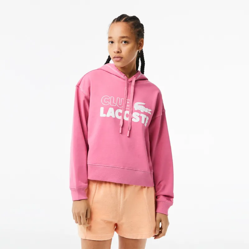 SWEATSHIRT À CAPUCHE FEMME LACOSTE OVERSIZE FIT ROSE AVEC MARQUAGE CONTRASTÉ