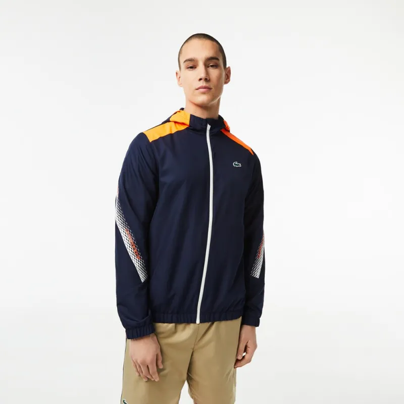 VESTE À CAPUCHE HOMME LACOSTE TENNIS EN POLYESTER RECYCLÉ BLEUE MARINE ET ORANGE